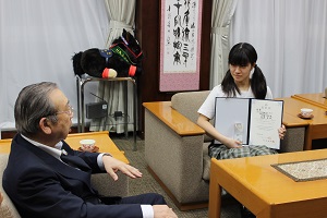 松原さんと広江町長の報告会の様子
